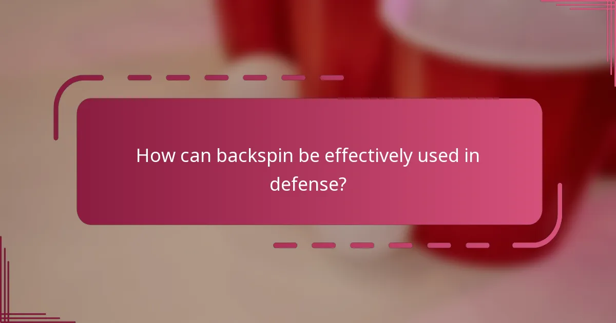 How can backspin be effectively used in defense?